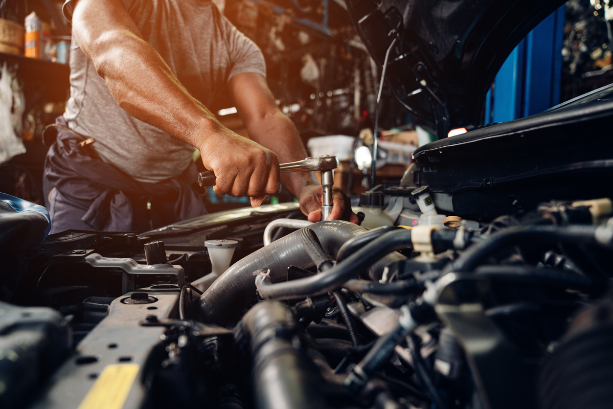 Auto Mechanic Are Repair And Maintenance Auto Engine Is Problems At Car Repair Shop.