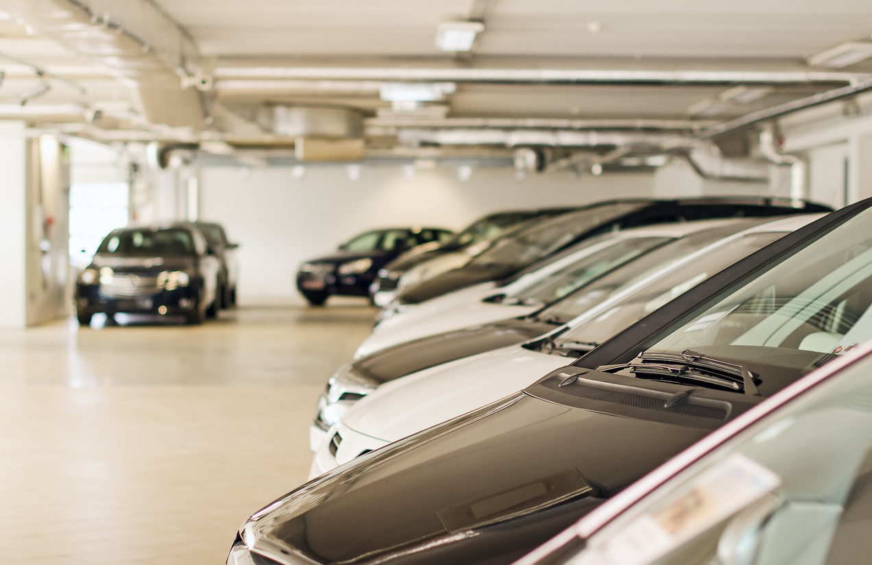 Many Cars In Parking Lot Or Garage.