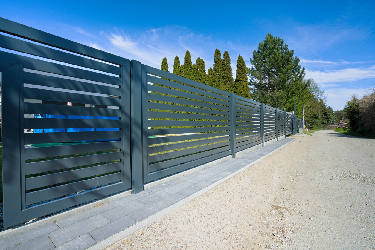 Metal Fence On The Road In The Countryside