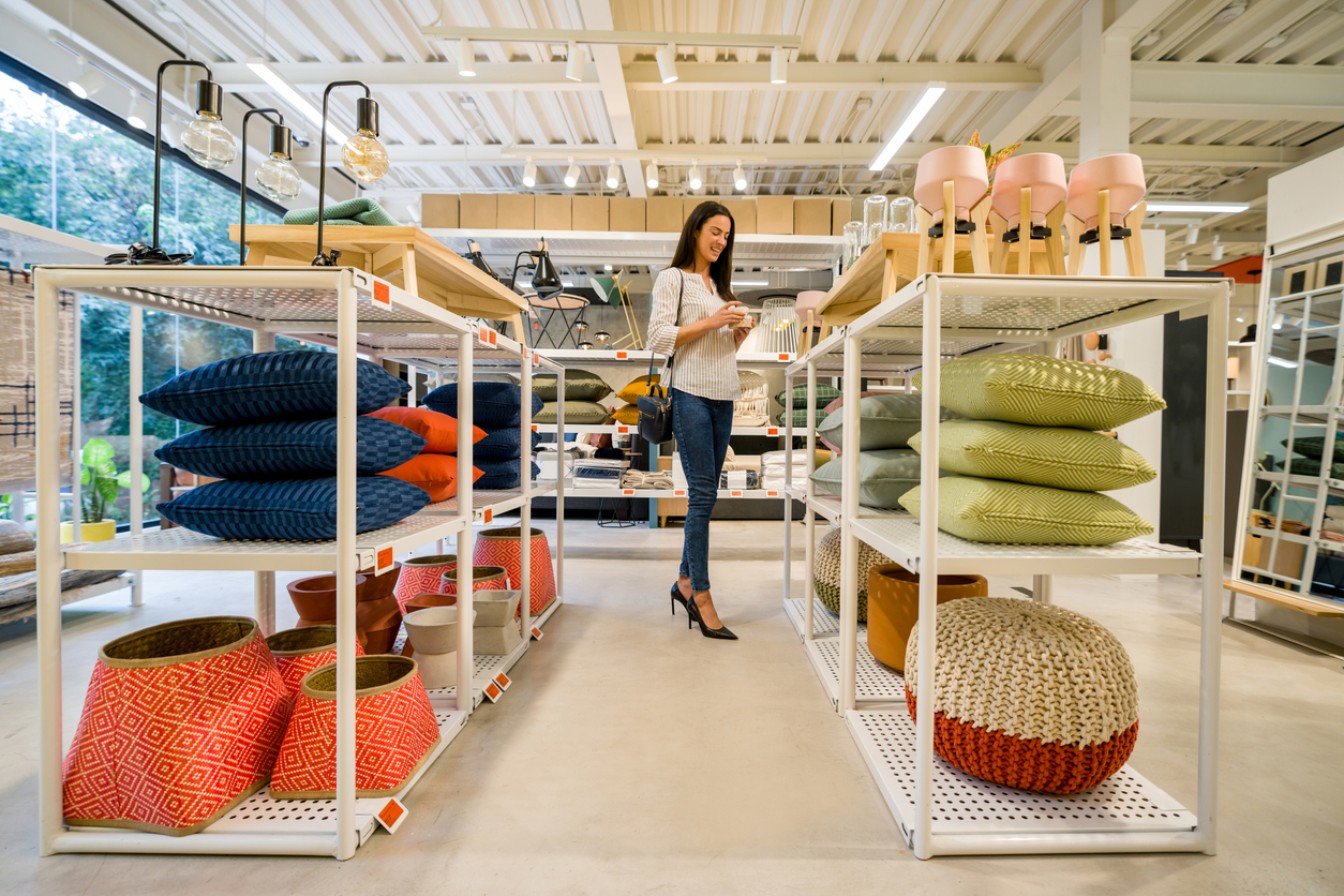 Happy Woman Shopping At A Home Decor Store