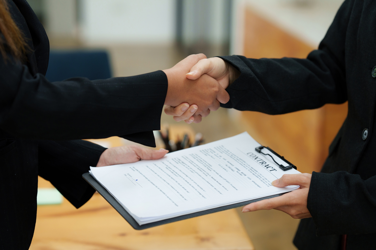 Real Estate Agent Explain Insurance And Agreement Contract To Client Before Sign Contract.