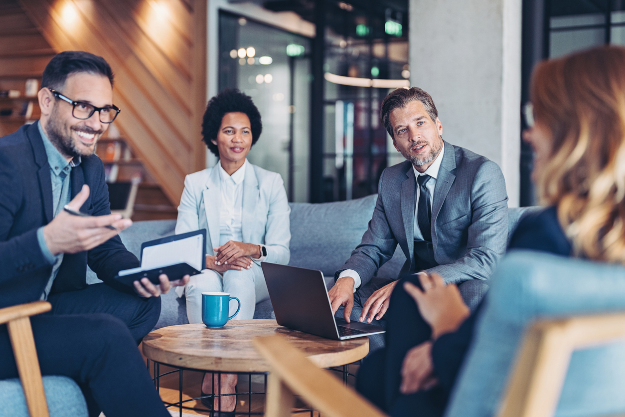 Group Of Entrepreneurs Talking In A Modern Office