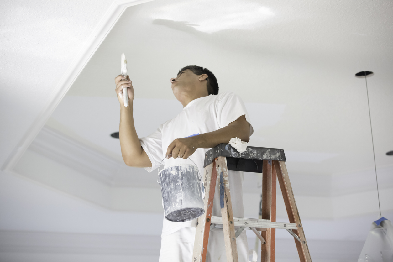 Painter Painting A Ceiling.